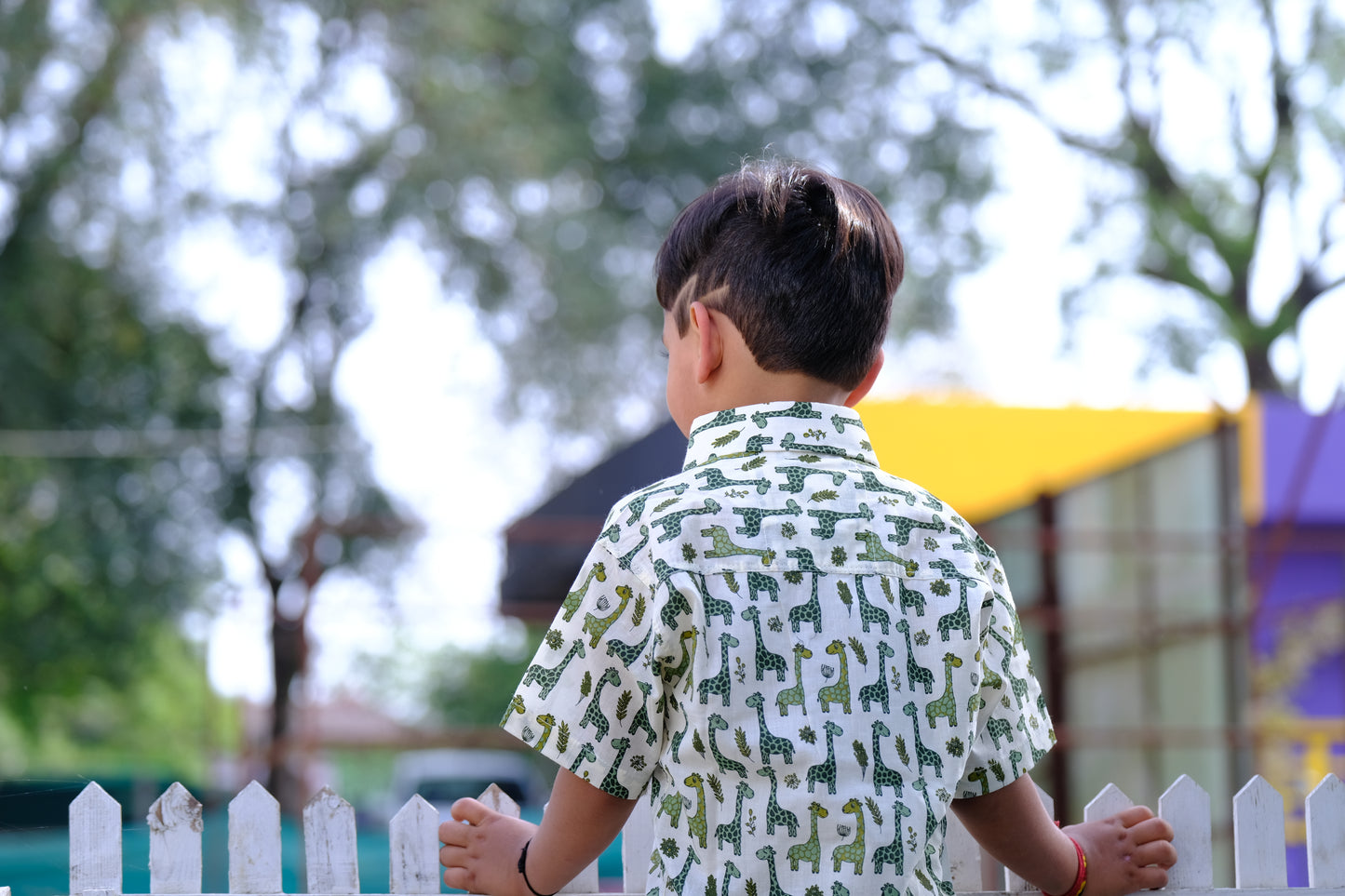 Two ten giraffe shirts